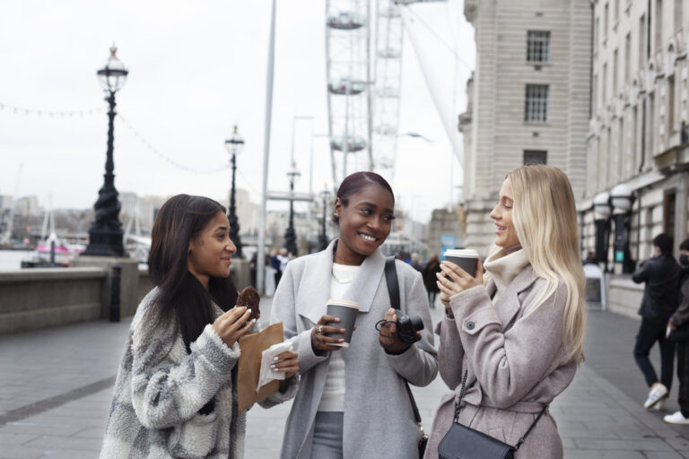 Young women in London exploring life under UK Visa Options