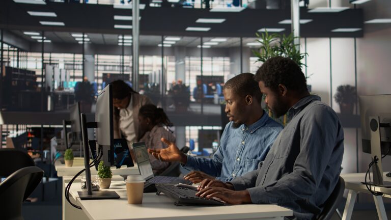 Teamwork under Canada's Fast-Track Immigration Programs for Tech Workers.